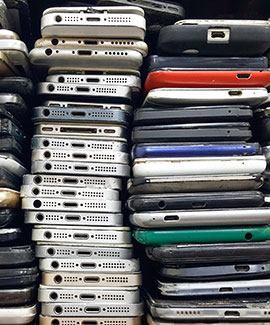 stacks of cellphones ready for recycling