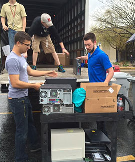 E-Waste being loaded onto a truck on shred day